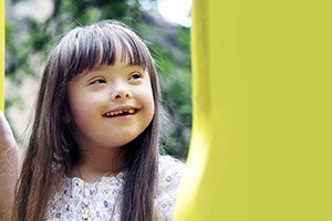 Little girl smiling after special needs children's dentistry visit