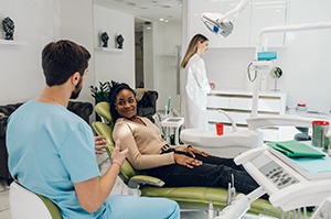 Dentist and patient discussing the details of treatment