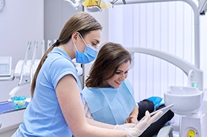 Patient conversing with dental team member
