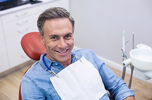 Smiling male patient, ready for dental implant treatment