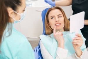Dental patient asking questions during consultation